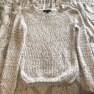 grey and white knit sweater